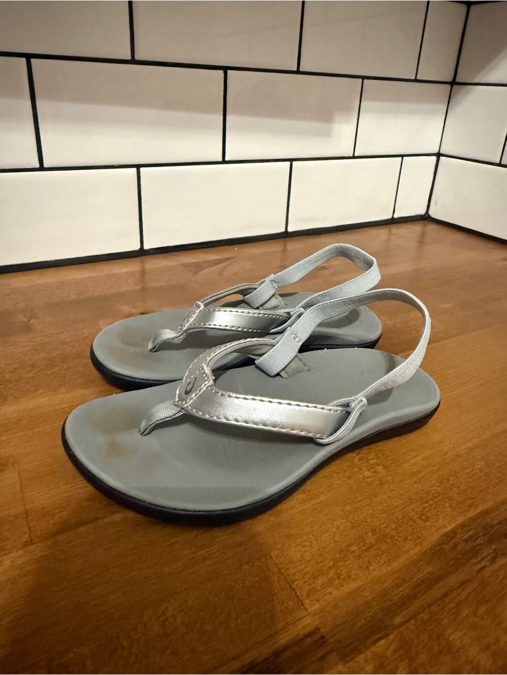 OluKai Kids Silver Metallic Slingback Thong Sandals